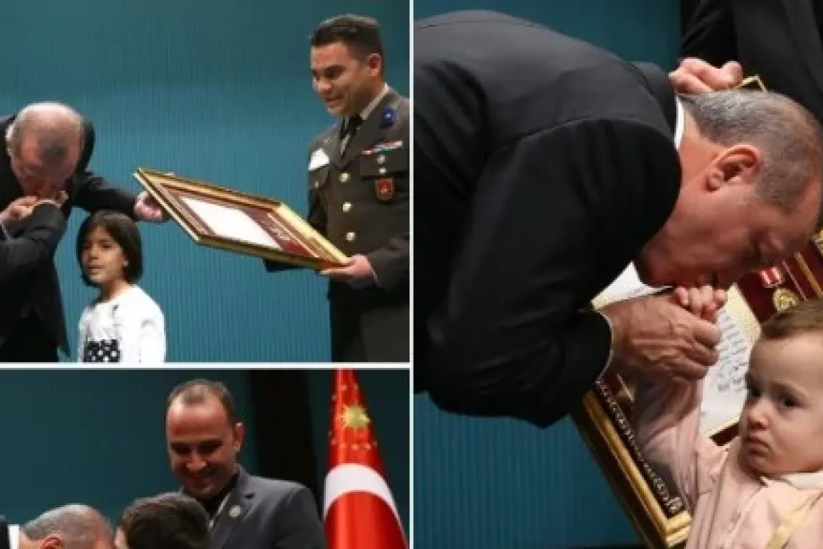 Çocukların ellerini öptü