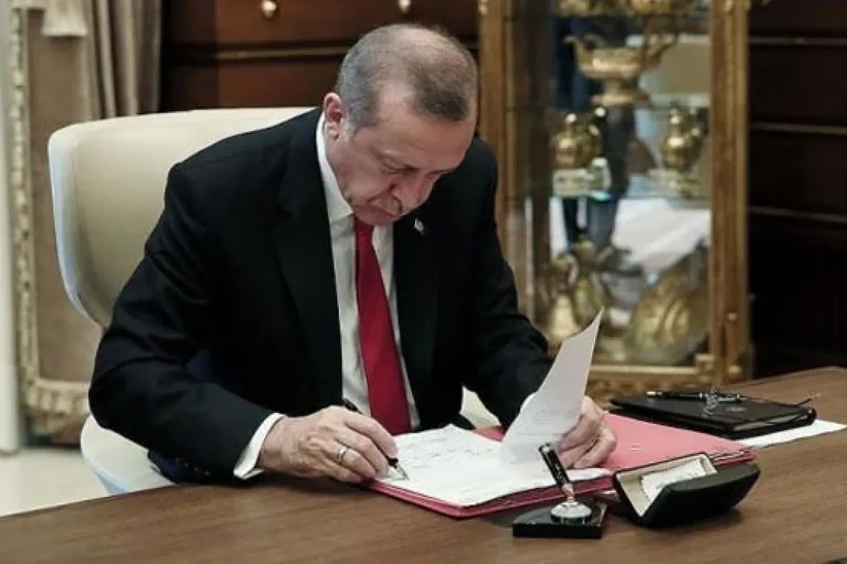 Erdoğan 10 maddelik uyum yasasını onayladı