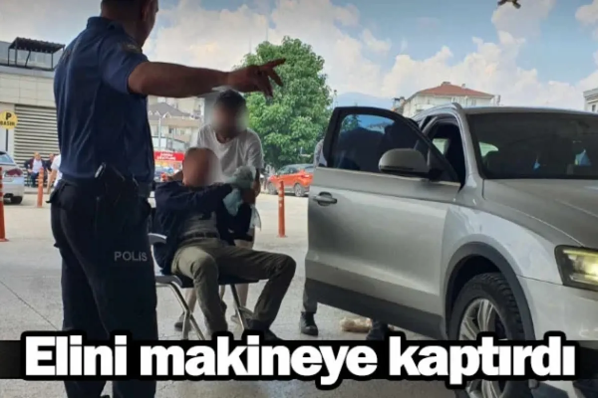 Elini makineye kaptırdı