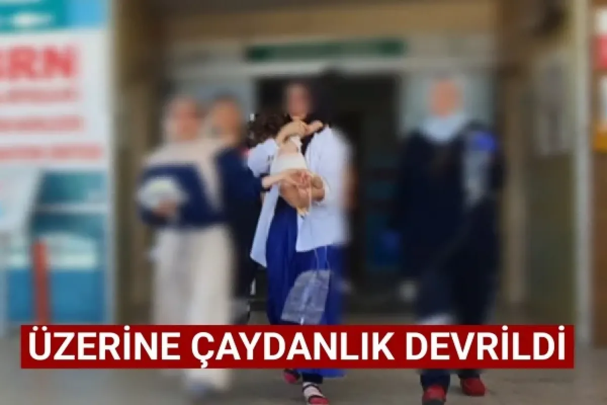 Üzerine çaydanlık devrildi