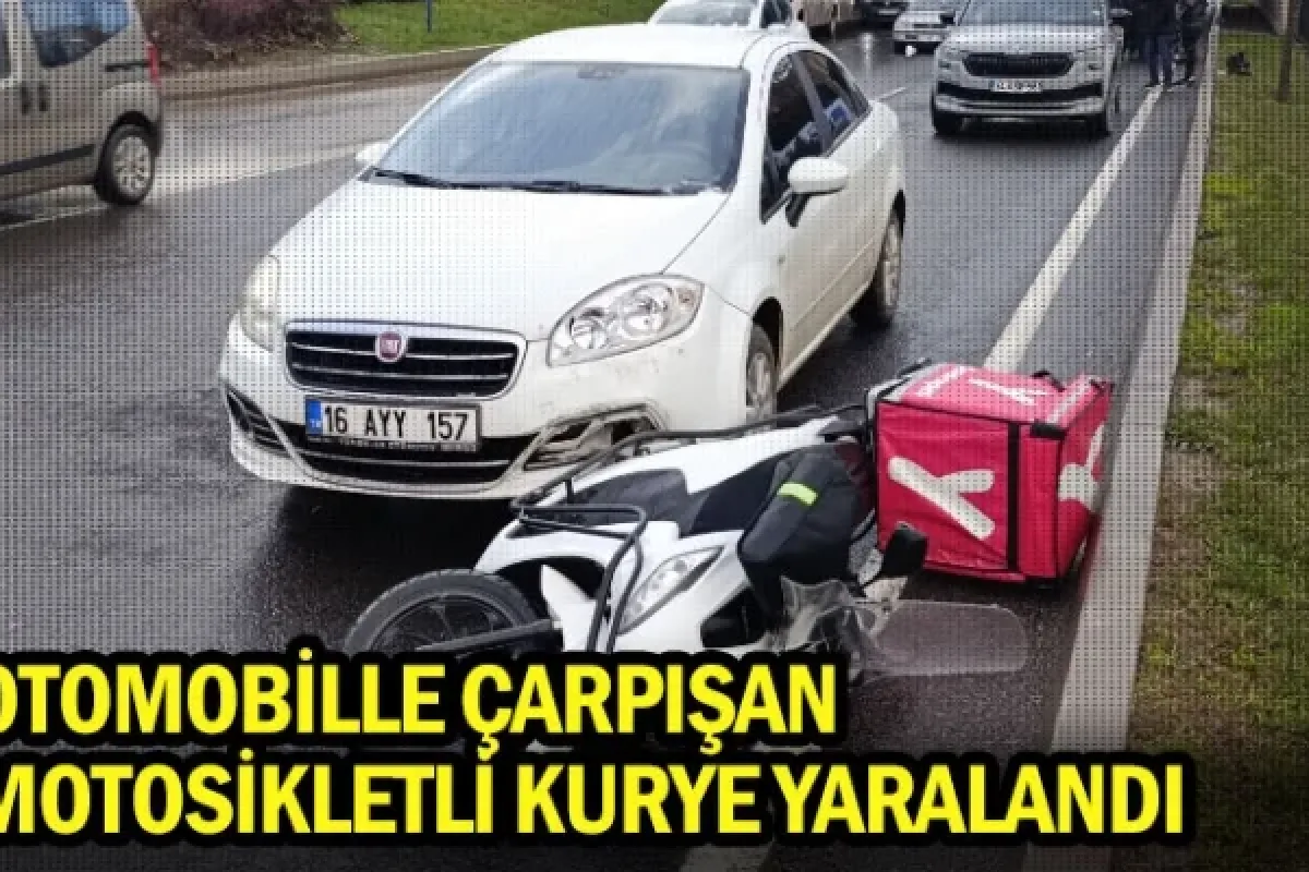 Otomobille çarpışan motosikletli kurye yaralandı