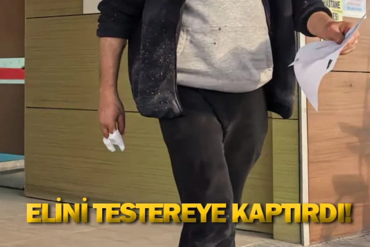 Elini testereye kaptırdı!