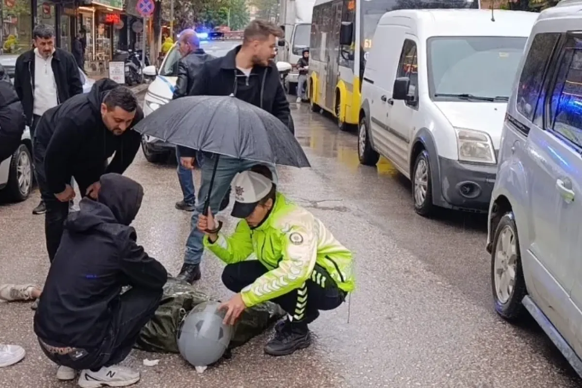 İnegöl'de yaralı genci yağmurdan koruyan polis memuruna Bakan Çiftçi'den teşekkür