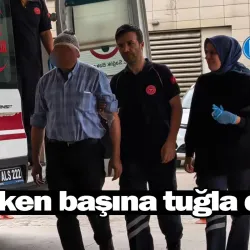 Yürürken başına tuğla düştü