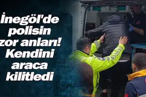 İnegöl'de polisin zor anları! Kendini araca kilitledi