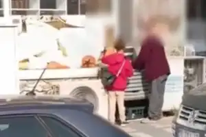 Topladığı paraları sayan dilenciler kamerada