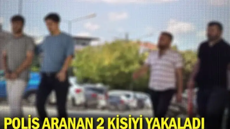 Polis aranan 2 kişiyi yakaladı