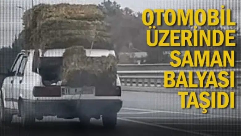 Otomobil üzerinde saman balyası taşıdı