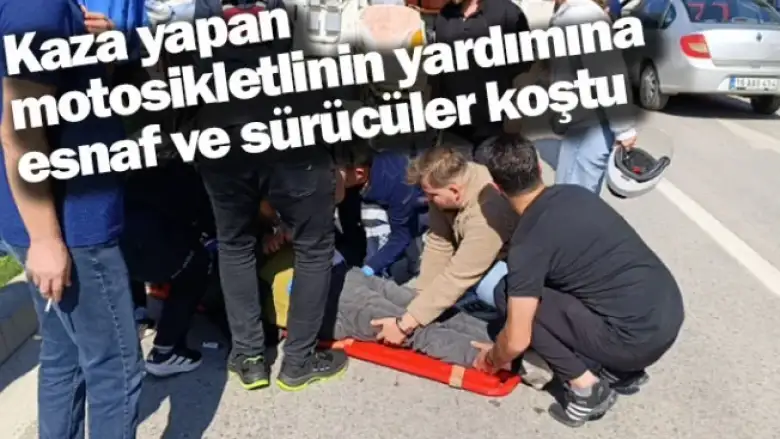 Kaza yapan motosikletlinin yardımına esnaf ve sürücüler koştu