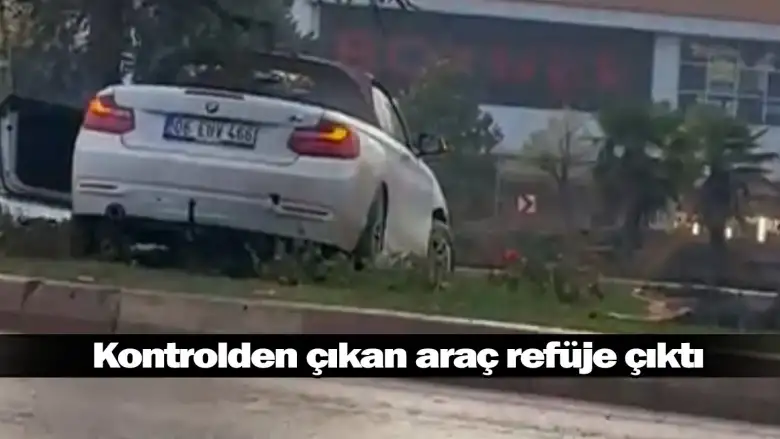 Kontrolden çıkan araç refüje çıktı