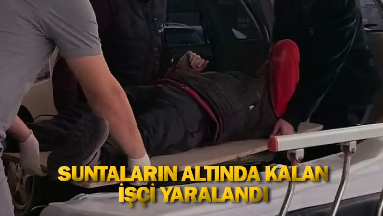 Suntaların altında kalan işçi yaralandı