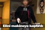 Elini makineye kaptırdı