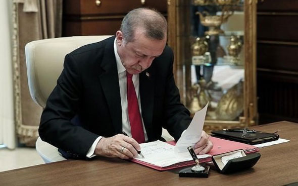 Erdoğan 10 maddelik uyum yasasını onayladı