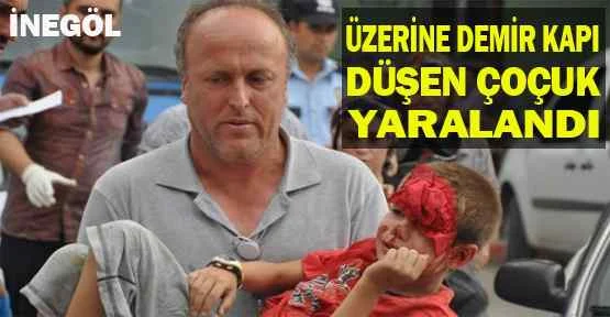 Üzerine demir kapı düşen çocuk yaralandı