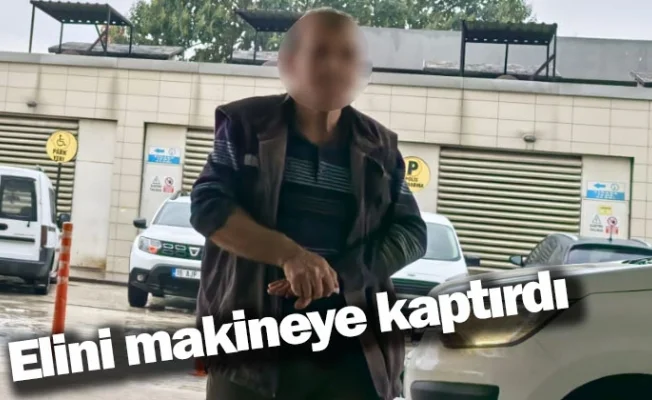 Elini makineye kaptırdı